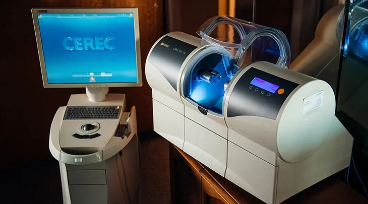 In-office CEREC milling unit at Modern Dental Concepts in Warren, OH — used to make same-day crowns in a single visit